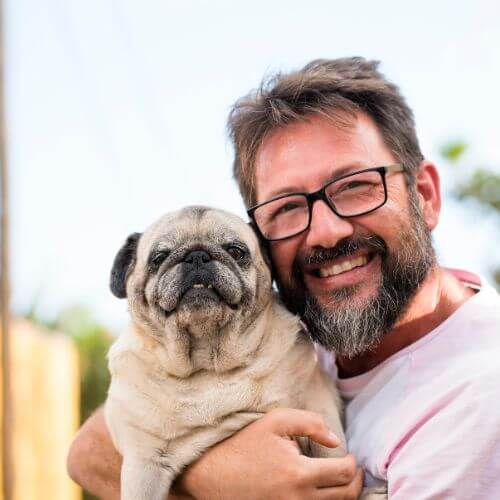 Michael R. Davidson and his dog Pug Zuckerberg